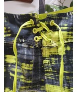 Nike Men&#39;s Black &amp; Yellow Polyester Pull On Swim Trunk Logo Print Shorts... - $61.54 CAD