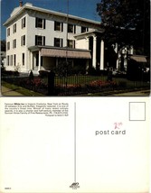 New York(NY) Fredonia White Inn Red Flowers Iron Fence Columns Vintage Postcard - $9.40