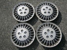 Factory original 1985 to 1989 Pontiac Grand AM 13 inch hubcaps wheel covers - $37.05