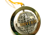 UNIVERSAL STUDIOS Rotating Globe Metal 3&quot; Christmas Ornament - $11.88