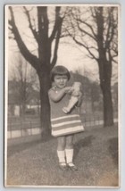 RPPC Darling Girl With Baby Doll In Park Real Photo Postcard S30 - £15.94 GBP