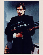 Timothy Dalton as James Bond holds telescopic rifle Living Daylights 8x10 photo - £9.37 GBP
