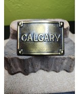 Calgary Belt Buckle Embossed Brass Tone Metal Buckle Canadian Cowboy 1970s - €19,23 EUR