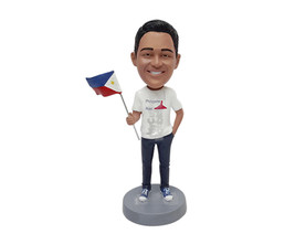 Custom Bobblehead Guy wearing a t-shirt and nice shoes holding his country&#39;s fla - £71.12 GBP