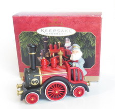 Superb Hallmark Christmas Ornament Jolly Locomotive Santa Metal Train QX... - $15.95