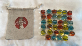 COCA COLA 5/8 SIZE MARBLES AND POUCH - $24.03