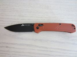 Ozark Trail 7.5 inch Folding Knife D2 Blade Orange Handle - $7.00