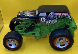 2004 Hot Wheels Grave Digger Monster Jam Truck 1:24 Scale Jacked Up - $14.03