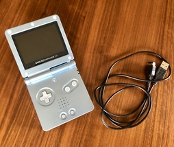 Nintendo Game Boy Advanced SP 101 - Pearl Blue - £141.42 GBP