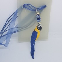 Necklace 2&quot; Painted Blue Parrot Charm Blue Silver Beads Blue Ribbon Cord - £11.73 GBP