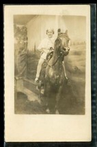 Vintage RPPC Photo Postcard Young Girl Studio Pose Horse Statue Western Saddle - £14.78 GBP