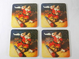 4 Vintage Coca Cola Cork Coasters Christmas Santa Claus Playing With Train - £2.72 GBP