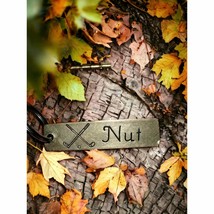 Funny little gold and black keychain that says NUT - £16.67 GBP