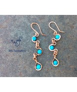 Handmade copper earrings: long dangle earrings with turquoise howlite - $596.99 MXN