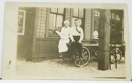 RPPC Man &amp; Woman On Wagon Store Front Town Real Photo c1907 Postcard I10 - £12.74 GBP