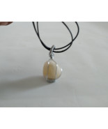 Quartz pendant,crystalized ,semitransparent and unique - $275.59 MXN