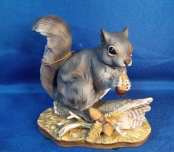 Vtg.Gray Squirrel Figurine Masterpiece Porcelain 1982- He has found some... - $37.39