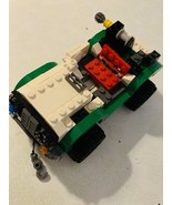 Various Lego pieces Including 4 wheels with Tires - $16.67 CAD