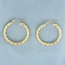 Twisting Hoop Earrings in 14k Yellow Gold - £203.49 GBP