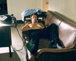 Dirty Harry Clint Eastwood Barechested 8x10 Real Photo lying on couch in office - $10.99