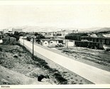 1940s Curteich Photo Finish Postcard Elko NV Curteich Street View Trains L5 - $15.79