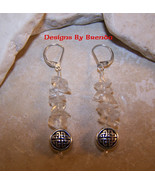 Quartz Crystal Celtic Knot Drop Earrings - $561.60 MXN