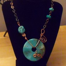 Large Turquoise donut with forged copper necklace- Introduct - $69.00
