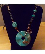 Large Turquoise donut with forged copper necklace- Introduct - $94.66 CAD