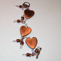 Unique Bracelet - Metallic Copper color 3 hearts. - $17.97