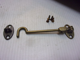 VINTAGE BRONZE  safety latch and hook articulated including mounting screws - $23.76