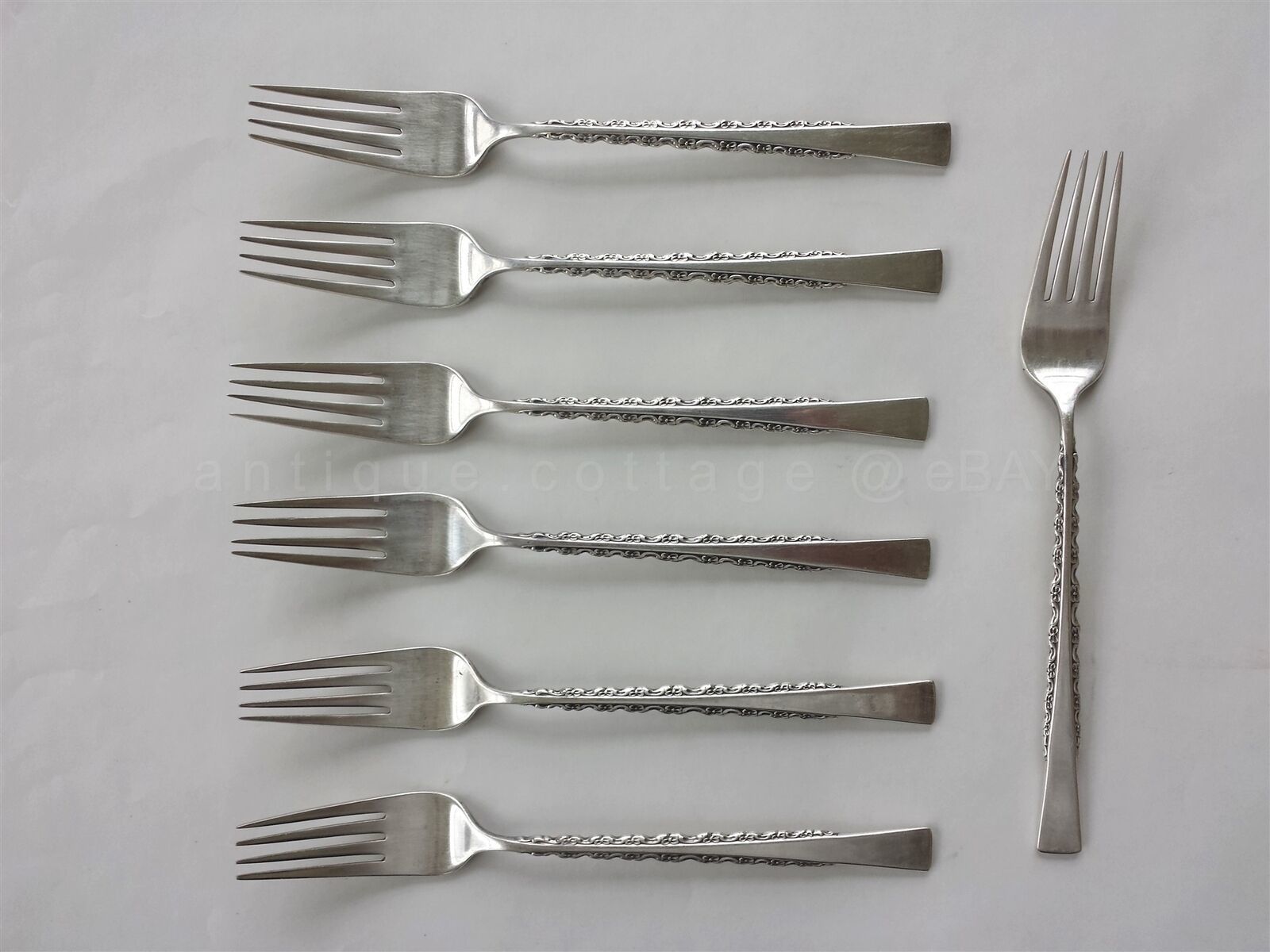 Primary image for antique INTERNATIONAL DEEPSILVER SILVERPLATE FLATWARE CAMILE 7 dinner forks