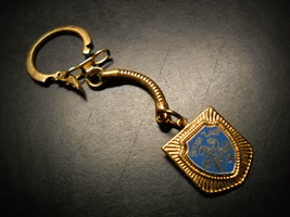 Geauga Lake Key Chain Gold Colored Fob with Blue Gold Shield Logo Amusement Park - £7.18 GBP