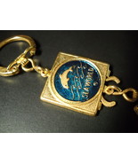 Sea World Key Chain Valet Style Gold Colored Metal with Blue and Gold Fe... - £6.31 GBP