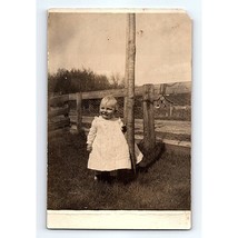 RPPC Real Photo Postcard Smiling Toddler Girl Standing on Farm - $24.74