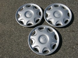 Factory original 1994 to 1996 Mazda MX3 14 inch hubcaps wheel covers - $46.40
