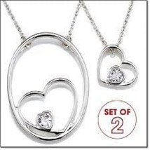 Avon Necklaces Nesting Hearts Charm New Boxed - $10.50