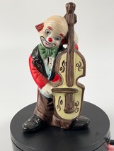 vintage figurine of  Porcelain white clown playing the bass cello - £11.14 GBP