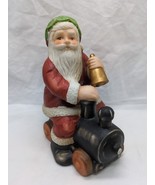 Santa Clause On A Train Holding Holiday Bell Christmas Ceramic - $19.79