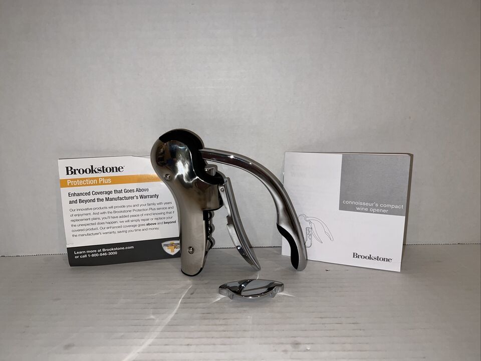 Brookstone chrome compact wine opener with foil cutter in box. - $10.39