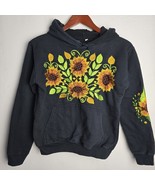Black hooded sweatshirt with an embroidered sunflower design on the fron... - $918.74 MXN