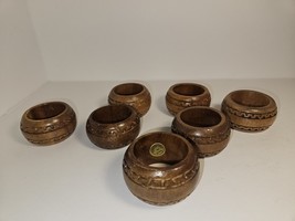 7 HAND CARVED WOOD NAPKIN RINGS - £5.40 GBP