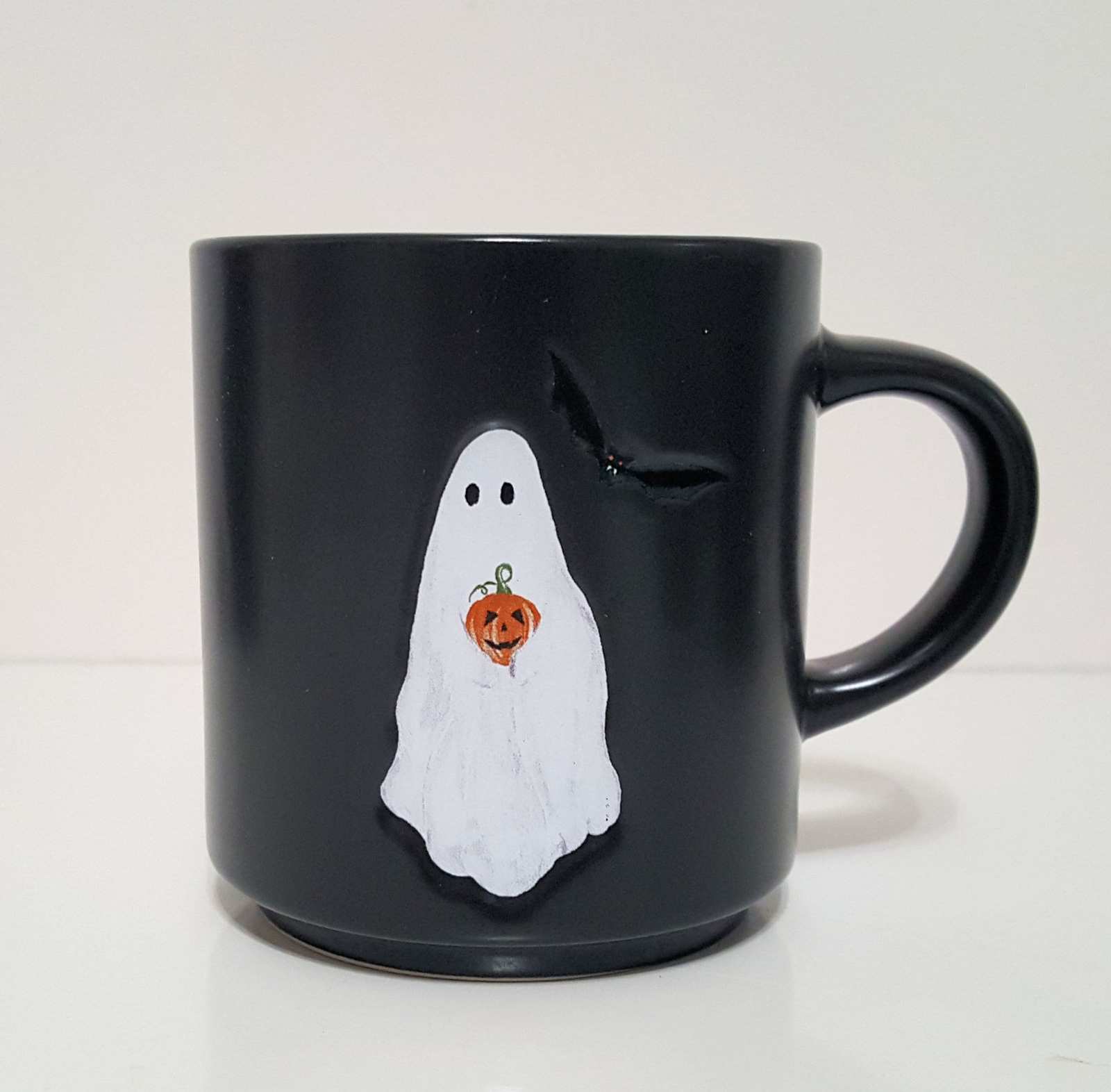 Primary image for NEW Pottery Barn Scary Squad Ghost Holding a Pumpkin Mugs 15 oz Stoneware