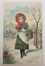 Victorian Trade Card Young Girl Holding Basket of Flowers Winter Scene Church - £11.48 GBP