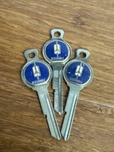 3 Oldsmobile Airship Logo Gold Tone &amp; Enamel Vintage Car Key Blanks - $54.45