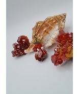 The neck pendant is made of vanadinite crystals - $63.00