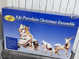 4 Pc Porcelain Christmas Ensemble: Santa, Sleigh, Two Reindeers Read - £33.66 GBP