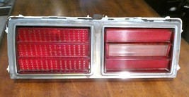 1975-1979 CHEVY NOVA TAILLIGHT HOUSING WITH LENS &amp; CHROME BEZEL OEM LH - €161,40 EUR