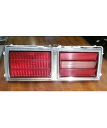 1975-1979 CHEVY NOVA TAILLIGHT HOUSING WITH LENS &amp; CHROME BEZEL OEM LH - $188.10