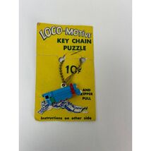 Vintage Loco-Motive Key Chain Puzzle Train 1950s Plastic Toy on Display ... - €38,90 EUR