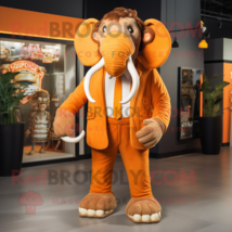 Orange Mammoth mascot costume character dressed with a Suit and Cufflinks - £975.03 GBP